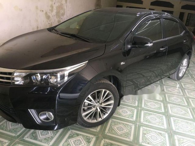 Cần bán Toyota Corolla Altis đời 2015, màu đen