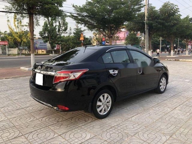 Bán xe Toyota Vios đời 2014, màu đen số tự động