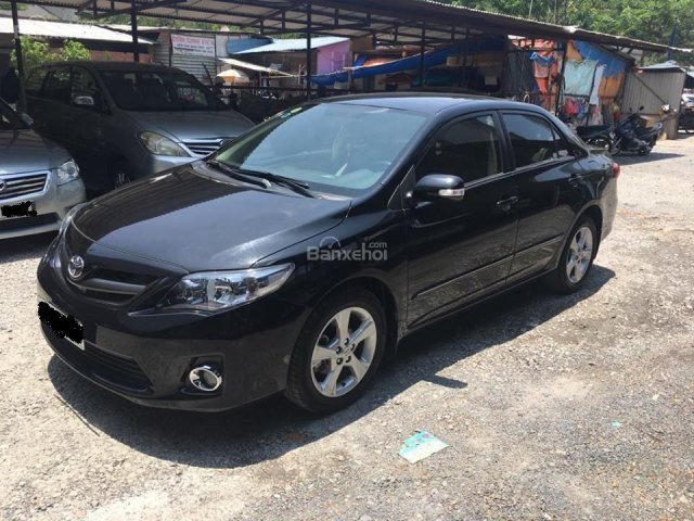 Bán xe Toyota Corolla altis đời 2012, màu đen ~11000 km, chính chủ