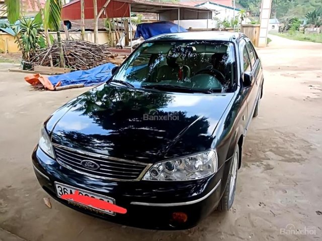 Bán xe Ford Laser Ghia 1.8 MT sản xuất năm 2004, màu đen, 200 triệu