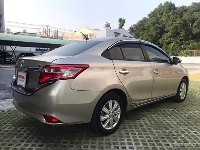 Cần bán lại xe Toyota Vios 1.5G AT sản xuất 2017, màu vàng