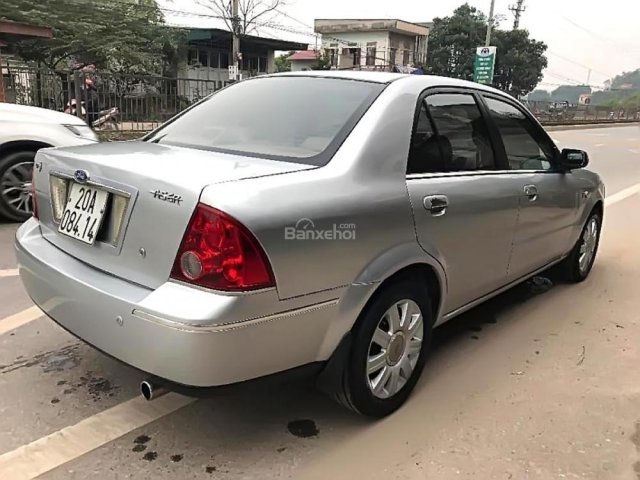 Bán xe Ford Laser GHIA 1.8 AT năm 2004, màu bạc