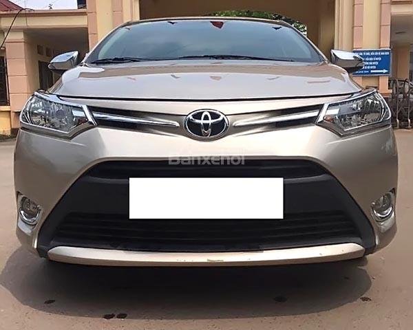 Bán Toyota Vios E sản xuất 2014, màu vàng