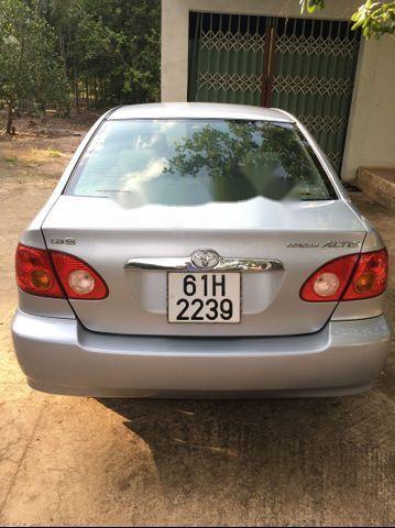 Bán Toyota Corolla altis 1.8G đời 2003, màu bạc 