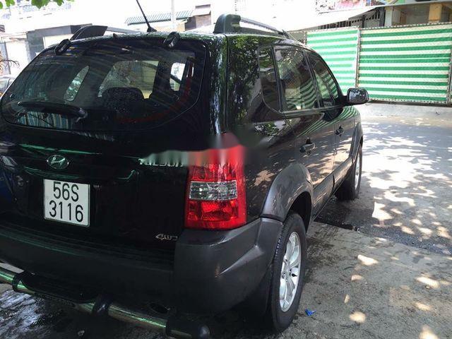 Bán xe Hyundai Tucson năm 2009, màu đen