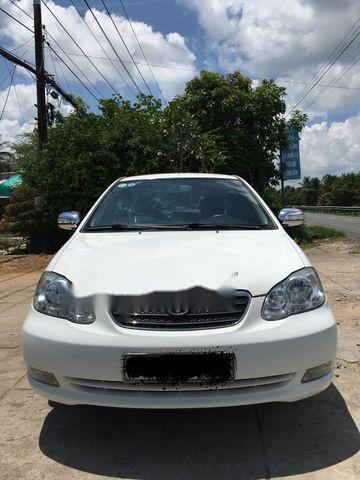 Cần bán xe Toyota Corolla altis năm 2004, màu trắng như mới, giá chỉ 298 triệu0