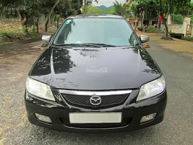 Bán xe Mazda 323 GLX đời 2003, màu đen chính chủ