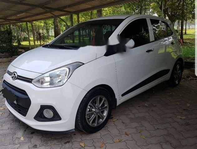 Cần bán Hyundai Grand i10 1.0AT sản xuất 2014, màu trắng xe gia đình