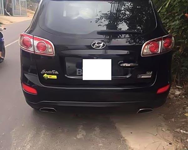 Bán Hyundai Santa Fe đời 2009, màu đen chính chủ, giá chỉ 592 triệu