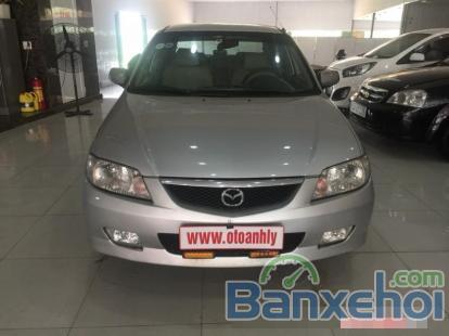 Cần bán lại xe Mazda 323 đời 2003, màu bạc