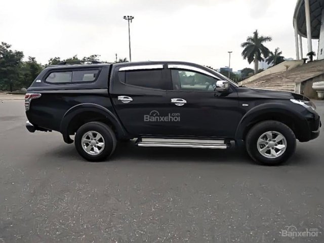 Bán xe Mitsubishi Triton 4x2 AT 2015, màu đen, xe nhập