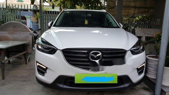 Bán Mazda CX 5 2.5AT sản xuất 2017, màu trắng mới chạy 2.700km