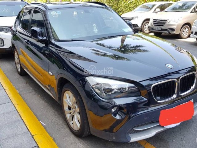 Cần bán BMW X1 SDrive 18i đời 2010, màu đen, xe nhập