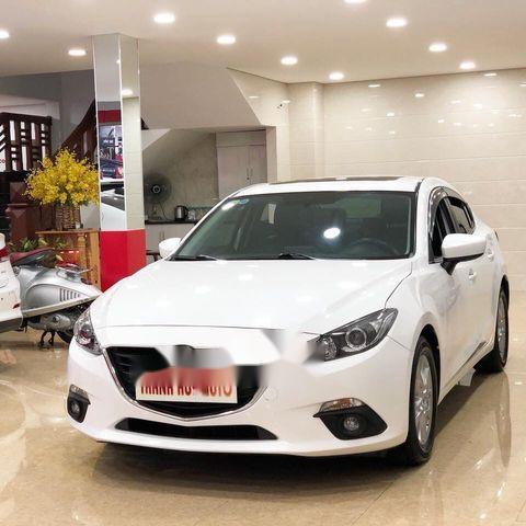 Cần bán lại xe Mazda 3 sản xuất 2015, màu trắng xe gia đình giá cạnh tranh