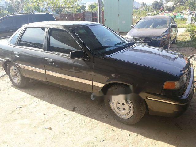 Cần bán Ford Tempo đời 1996, màu đen, giá chỉ 58 triệu0