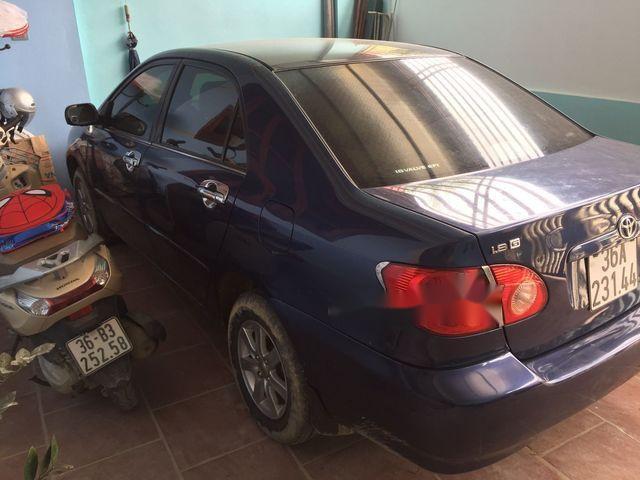 Bán Toyota Corolla altis 1.8G đời 2003, màu đen chính chủ