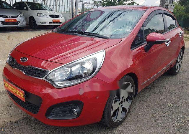 Cần bán gấp Kia Rio 1.4AT đời 2014, màu đỏ, nhập khẩu nguyên chiếc, 480tr