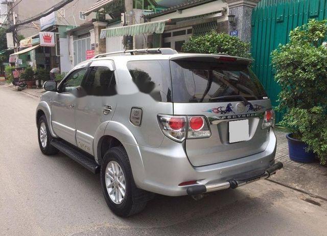 Bán Toyota Fortuner G sản xuất 2013, màu bạc xe gia đình