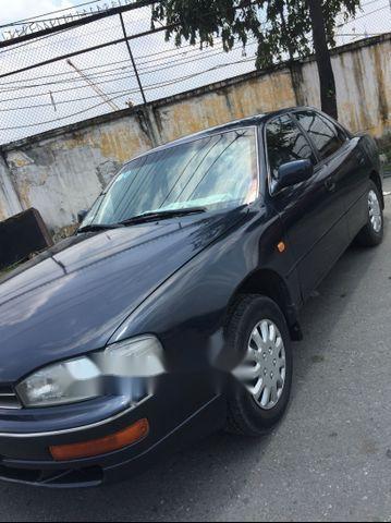 Gia đình bán Toyota Camry đời 1993, màu xanh