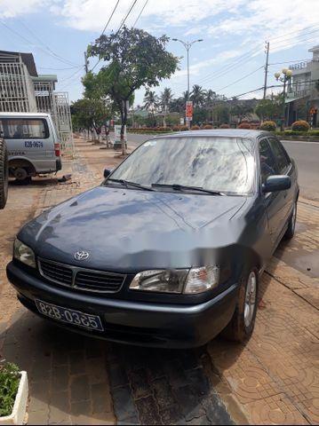 Cần bán gấp Toyota Corolla altis đời 2000, màu đen, 160tr