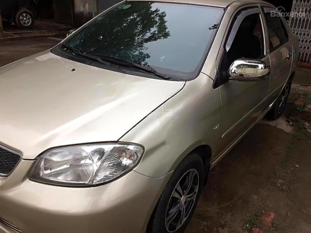 Cần bán Toyota Vios 1.5G sản xuất 2003, màu vàng xe gia đình