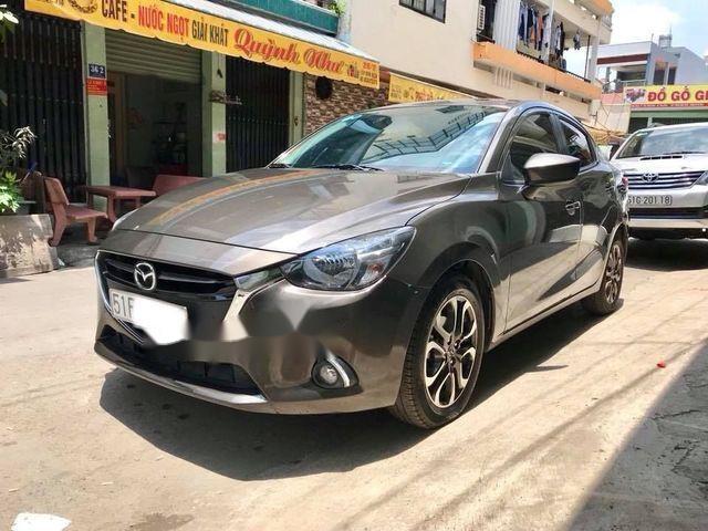 Cần bán xe Mazda 2 năm 2016, màu nâu xe gia đình, giá chỉ 500 triệu