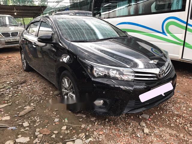 Bán Toyota Corolla Altis 1.8 năm sản xuất 2016, màu đen, giá 715tr