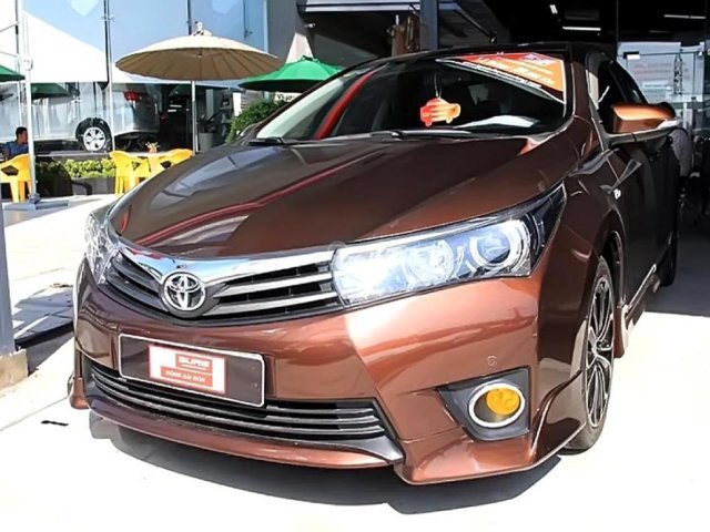 Cần bán Toyota Corolla altis 2.0V đời 2014, màu nâu