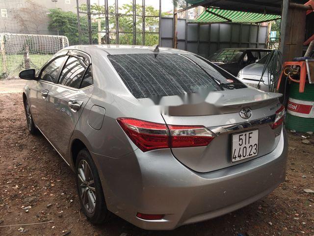 Bán xe Toyota Corolla altis đời 2016, màu bạc  