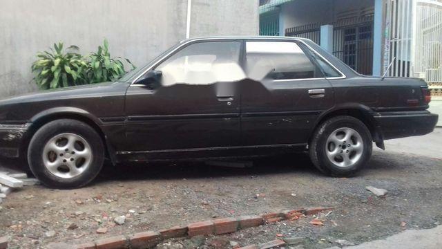 Cần bán Toyota Camry năm 1991, màu đen, 27 triệu