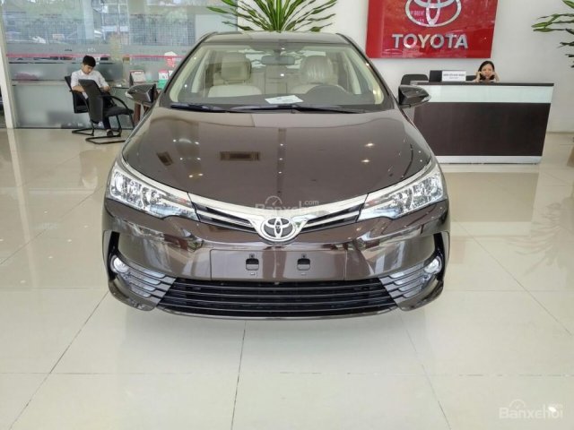 Bán Toyota Corolla Altis 1.8G CVT 2018 - màu nâu - Mua xe giá tốt, hỗ trợ trả góp 90%. Hotline: 0973.306.136