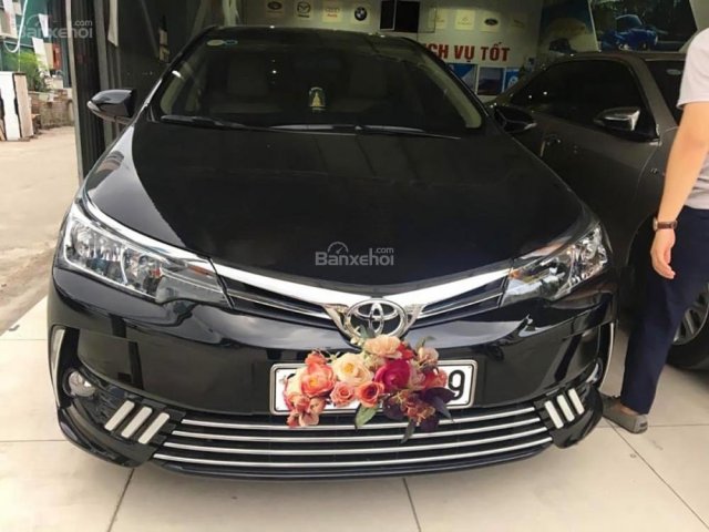 Cần bán gấp Toyota Corolla altis 1.8G AT đời 2018, màu đen, giá 775tr