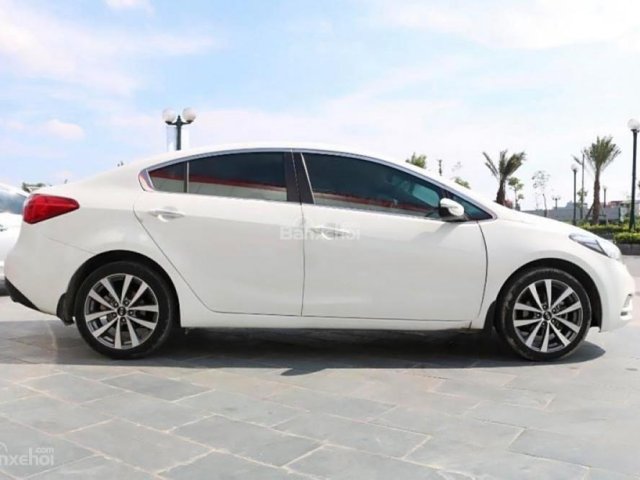 Cần bán Kia K3 1.6 AT đời 2015, màu trắng, giá 554tr