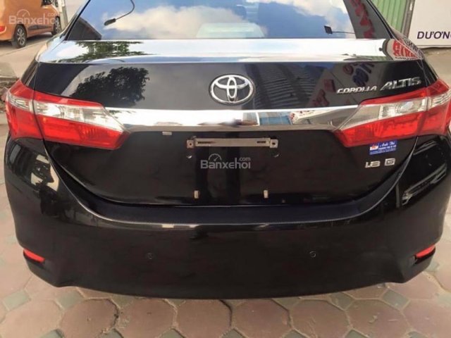 Cần bán Toyota Corolla altis 1.8G AT đời 2015, màu đen  