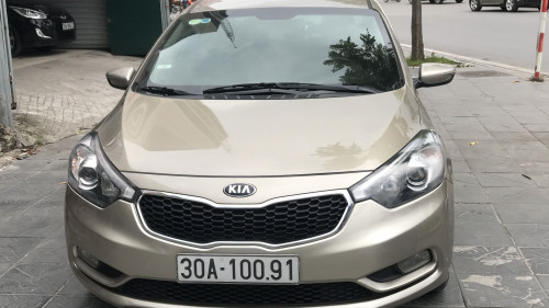 Bán Kia K3 1.6 MT năm 2014, màu vàng cát