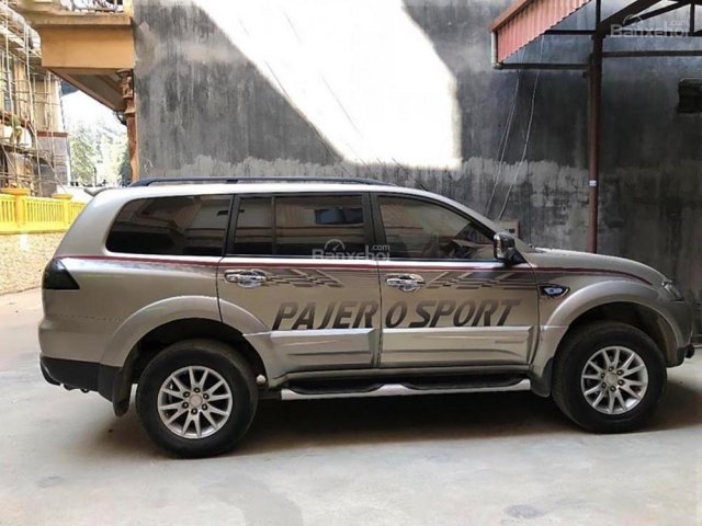 Bán Mitsubishi Pajero Sport đời 2014, màu vàng cát0