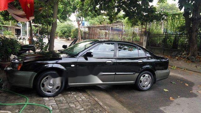 Bán Daewoo Magnus 2.5AT năm sản xuất 2004, màu đen, giá tốt