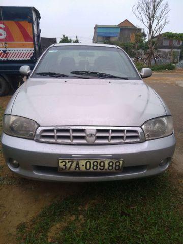 Cần bán Kia Spectra đời 2005, màu bạc, 120 triệu