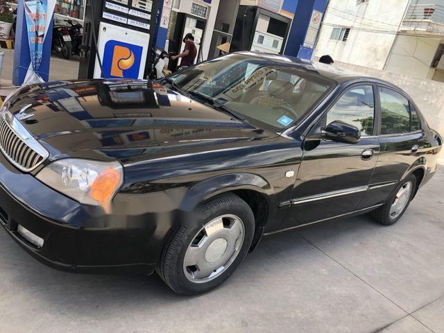 Cần bán lại xe Daewoo Magnus sản xuất năm 2005, màu đen đẹp như mới