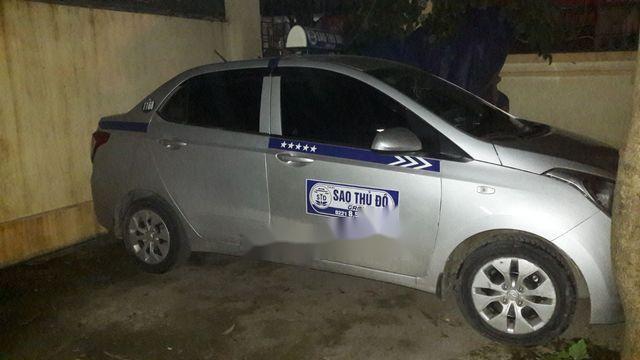 Bán taxi Hyundai Grand i10 đời 2016, màu bạc 