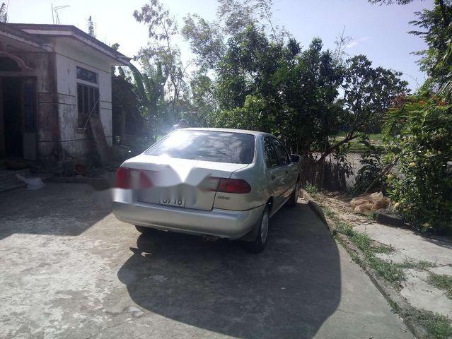 Cần bán Nissan Sunny đời 1996, màu bạc0