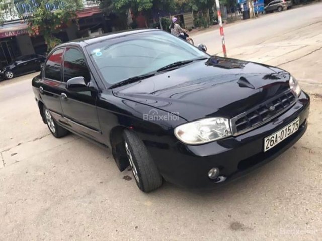 Cần bán lại xe Kia Spectra 1.6 MT sản xuất năm 2003, màu đen như mới, 100 triệu