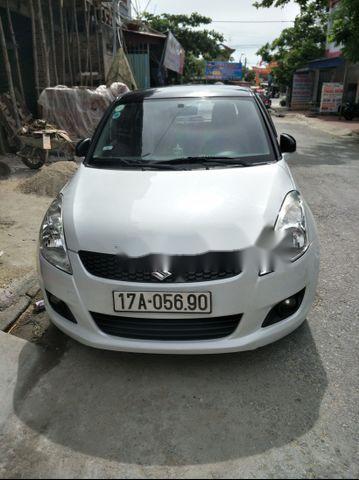 Cần bán gấp Suzuki Swift sản xuất năm 2014, màu bạc chính chủ