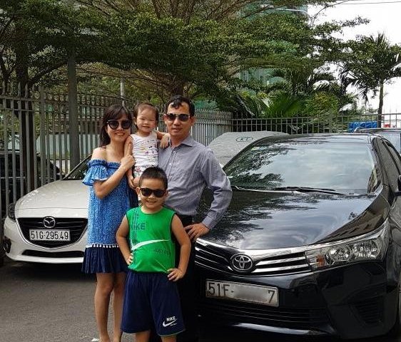Bán xe Toyota Corolla altis 1.8MT đời 2015, màu đen số sàn, 580 triệu
