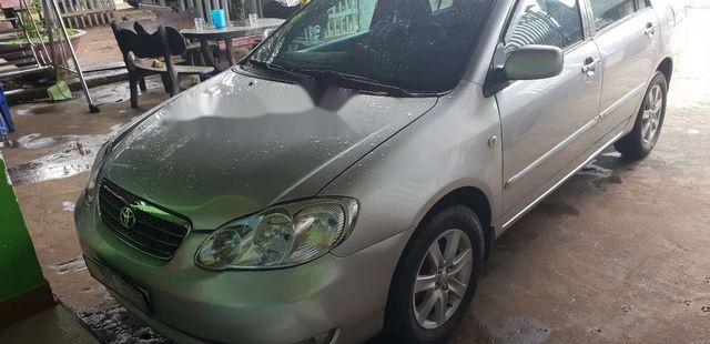 Cần bán lại xe Toyota Corolla altis sản xuất năm 2004, màu bạc