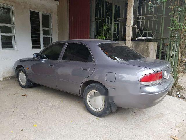 Cần bán lại xe Mazda 626 năm sản xuất 1997, màu xám xe gia đình0