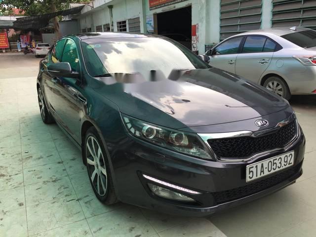 Cần bán xe Kia Optima AT 2011, màu đen, lăn bánh 2011