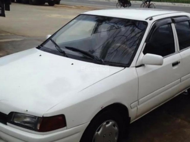 Bán Mazda 323 1.6 MT sản xuất 1995, màu trắng, nhập khẩu nguyên chiếc