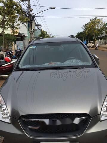 Cần bán xe Kia Carens SX 2010, màu xám, số tự động, máy móc êm