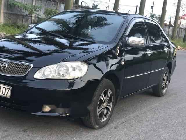 Cần bán xe Toyota Corolla Altis MT đời 2003, màu đen
